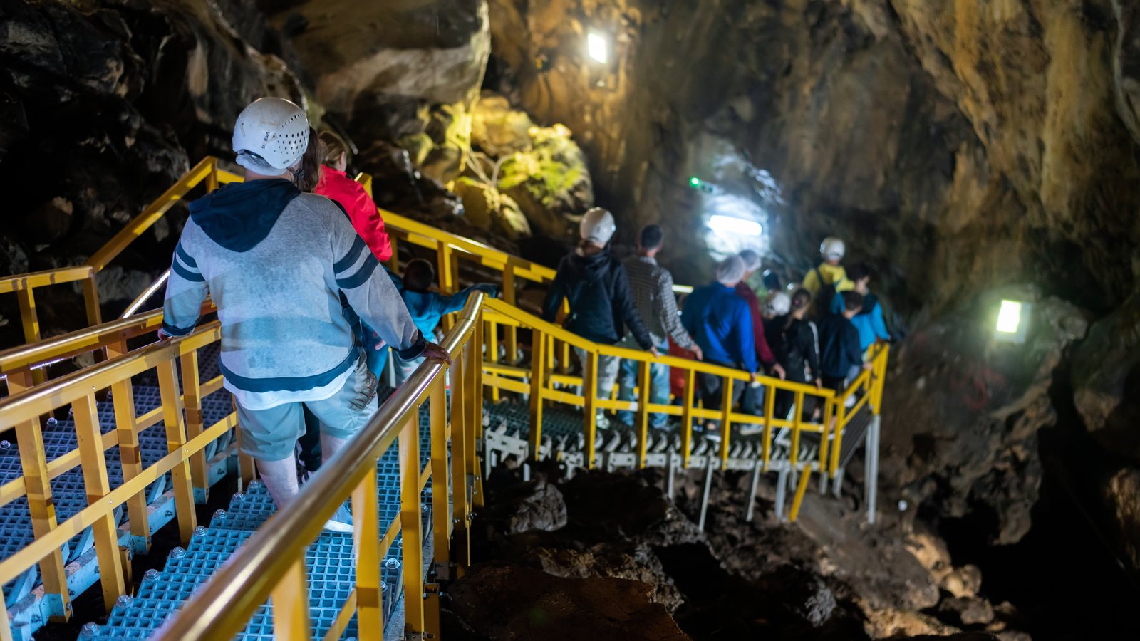 Underground coal mining crew operating heavy equipment onsite